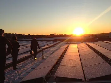 sunset over solar panels at kalbakken