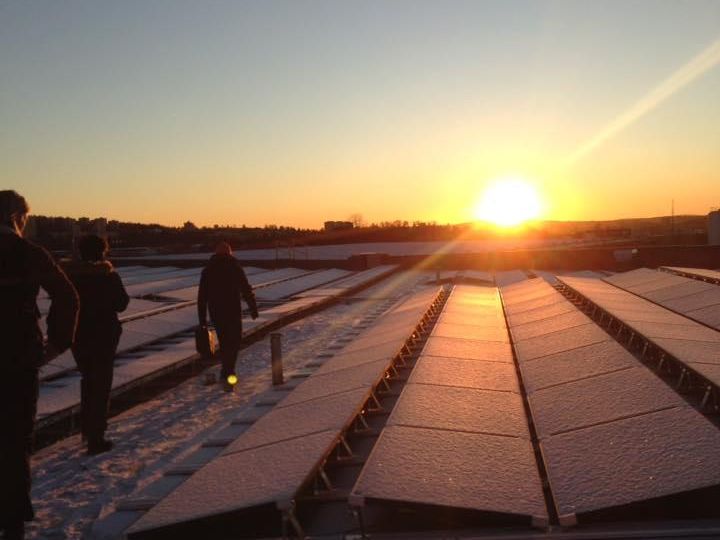 sunset over solar panels at kalbakken